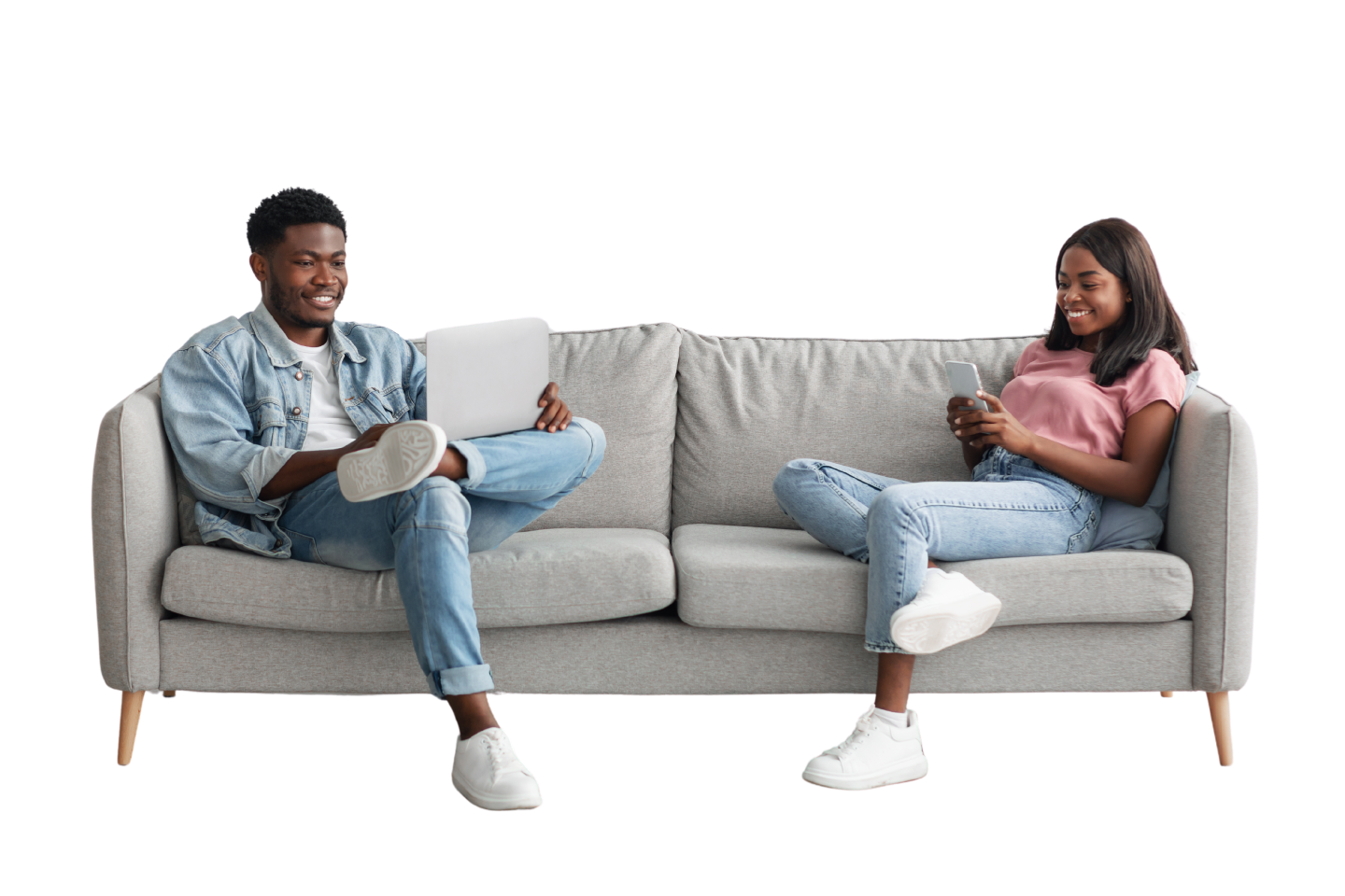 people sitting on a couch and smiling